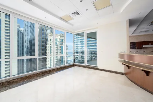 Penthouse | Unfurnished | Partial Palm View