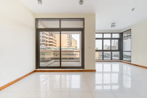 Unfurnished | 2 Balconies | Partial Lake View