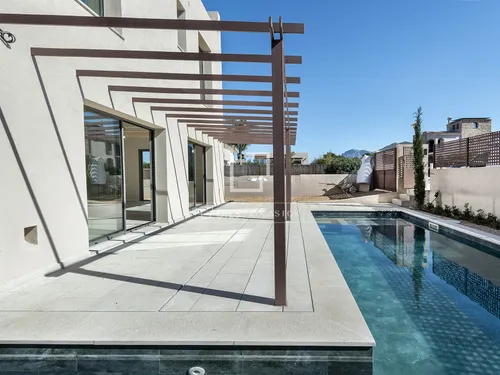 Contemporary Villa with L-Shaped Pool and Sea-View Rooftop Terrace in Colònia de Sant Pere