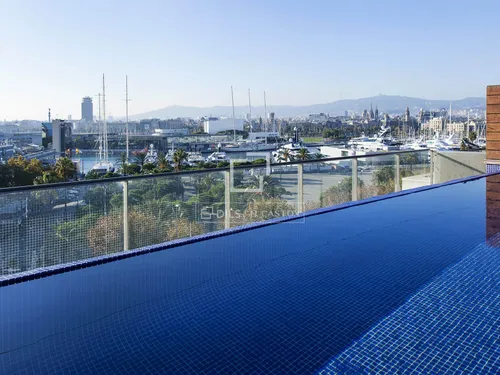Exceptional duplex penthouse for sale with private pool and excellent views of the marina and Barcelona city
