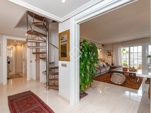 Stylish and spacious 4-bedroom penthouse with sea-view rooftop terrace for sale in Ibiza centre